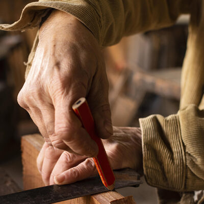 side-view-person-making-line-with-pencil