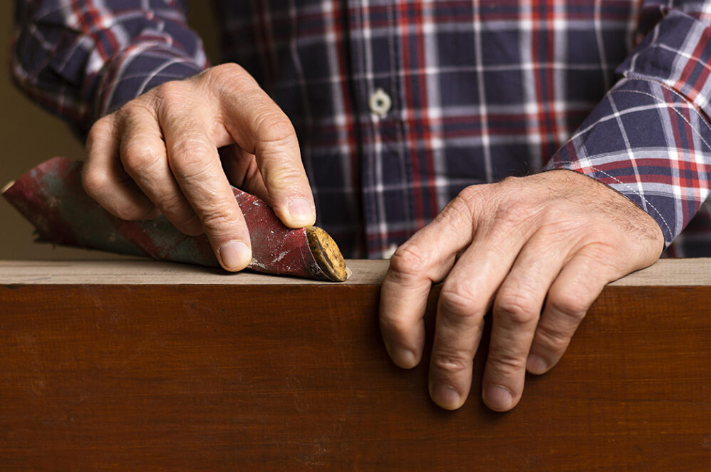 close-up-man-polishing